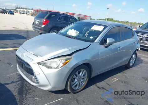 2018 Toyota Yaris Ia из США, поврежденный, VIN 3MYDLBYV7JY333597